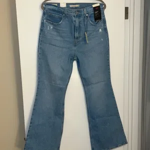 Levi’s 70s high rise flare ultra high rise blue denim jeans 30x32