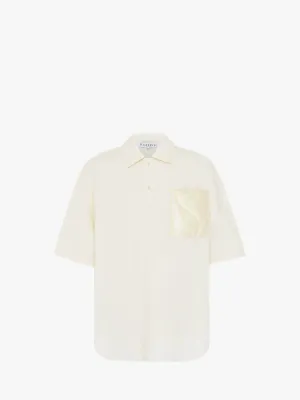 QUILTED POCKET POLO TOP