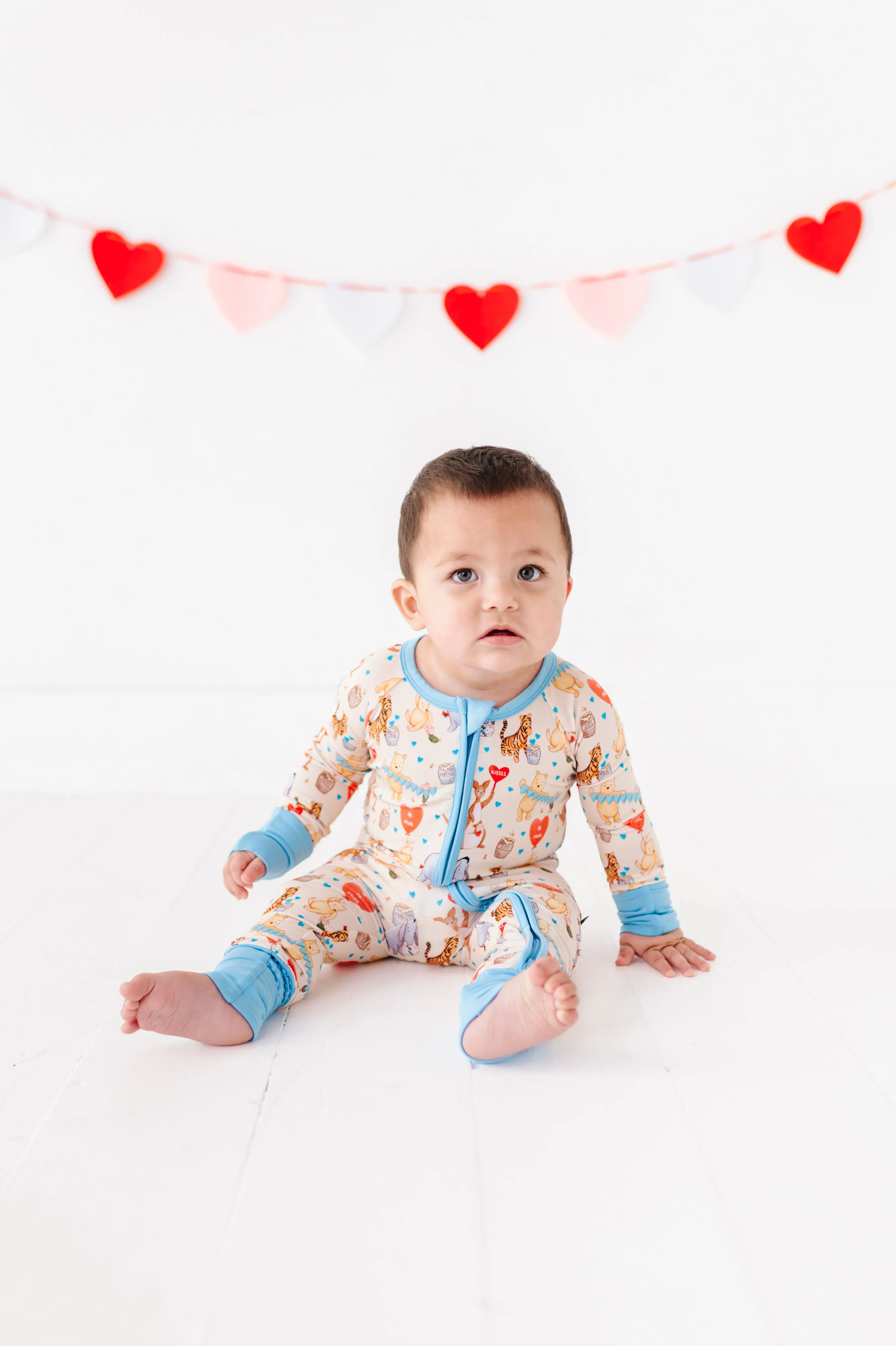 The Sleepy Sloth 100 ACRES OF HUGS Winnie the Pooh Print Zip Jammies Convertible Romper