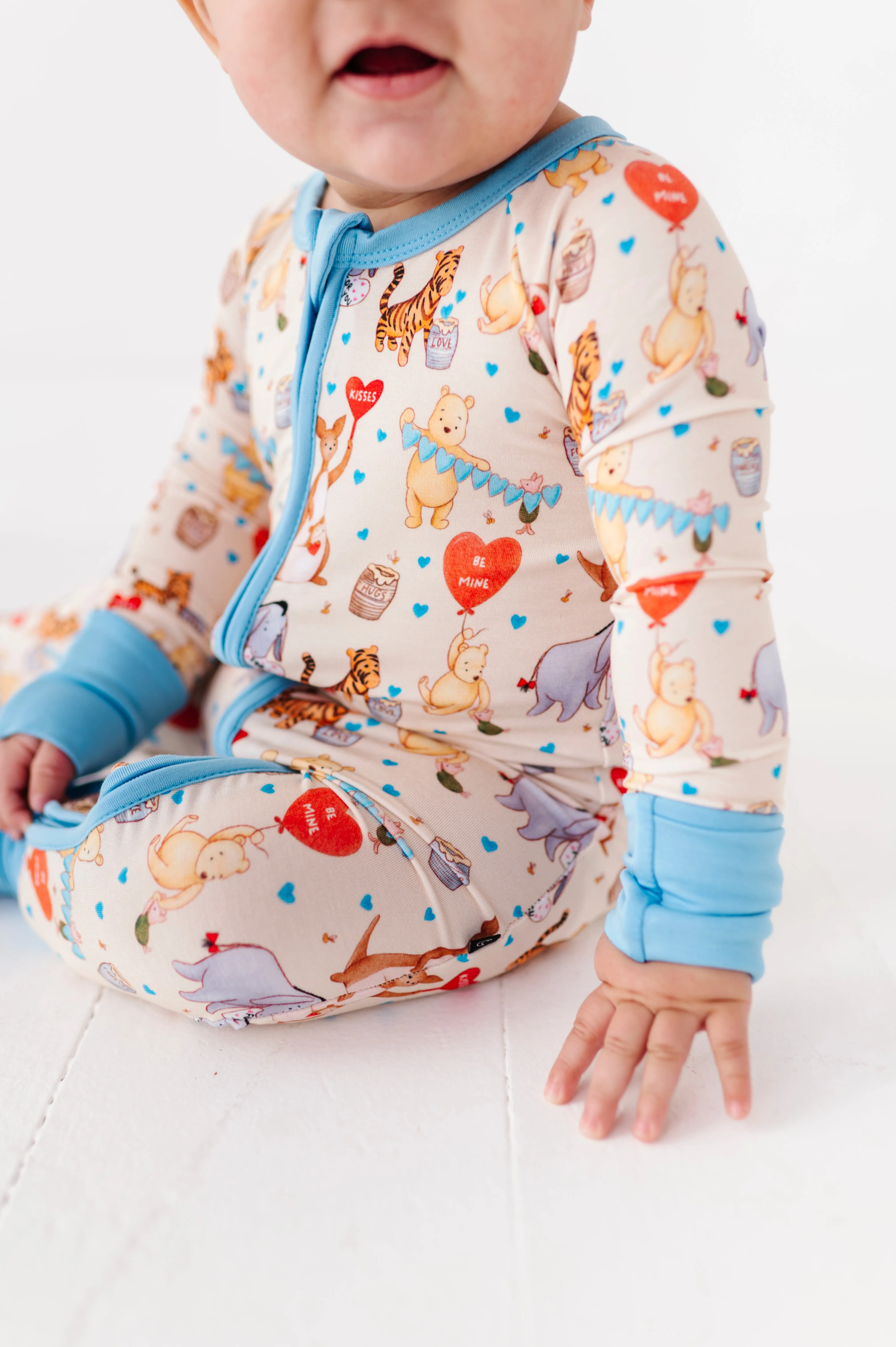 The Sleepy Sloth 100 ACRES OF HUGS Winnie the Pooh Print Zip Jammies Convertible Romper